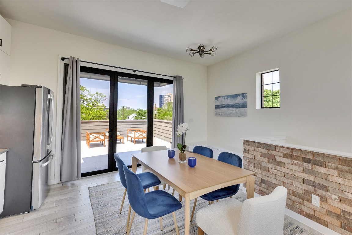 808 Lydia Street Austin, TX 78702 - Photo 21 of 40 a dining room with furniture and window