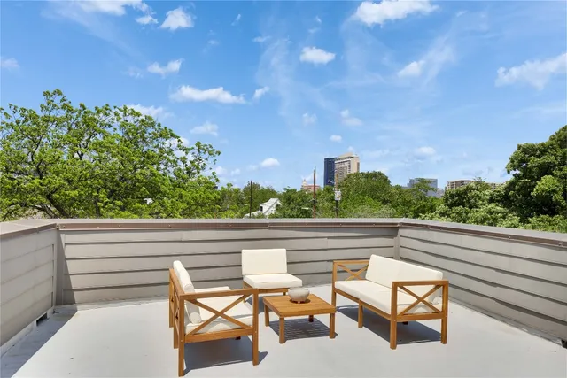 a view of a bench in roof deck