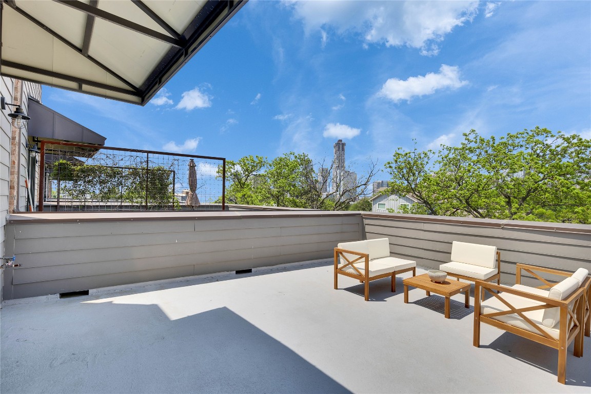 808 Lydia Street Austin, TX 78702 - Photo 24 of 40 a view of balcony with two chairs and a couch