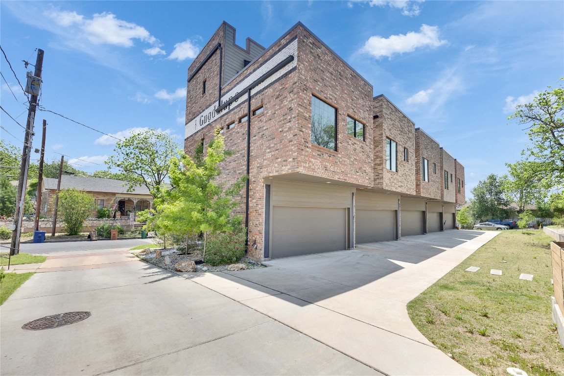 808 Lydia Street Austin, TX 78702 - Photo 31 of 40 a front view of a house with a yard and potted plants