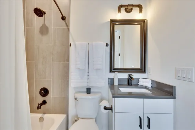 a view of staircase with white walls