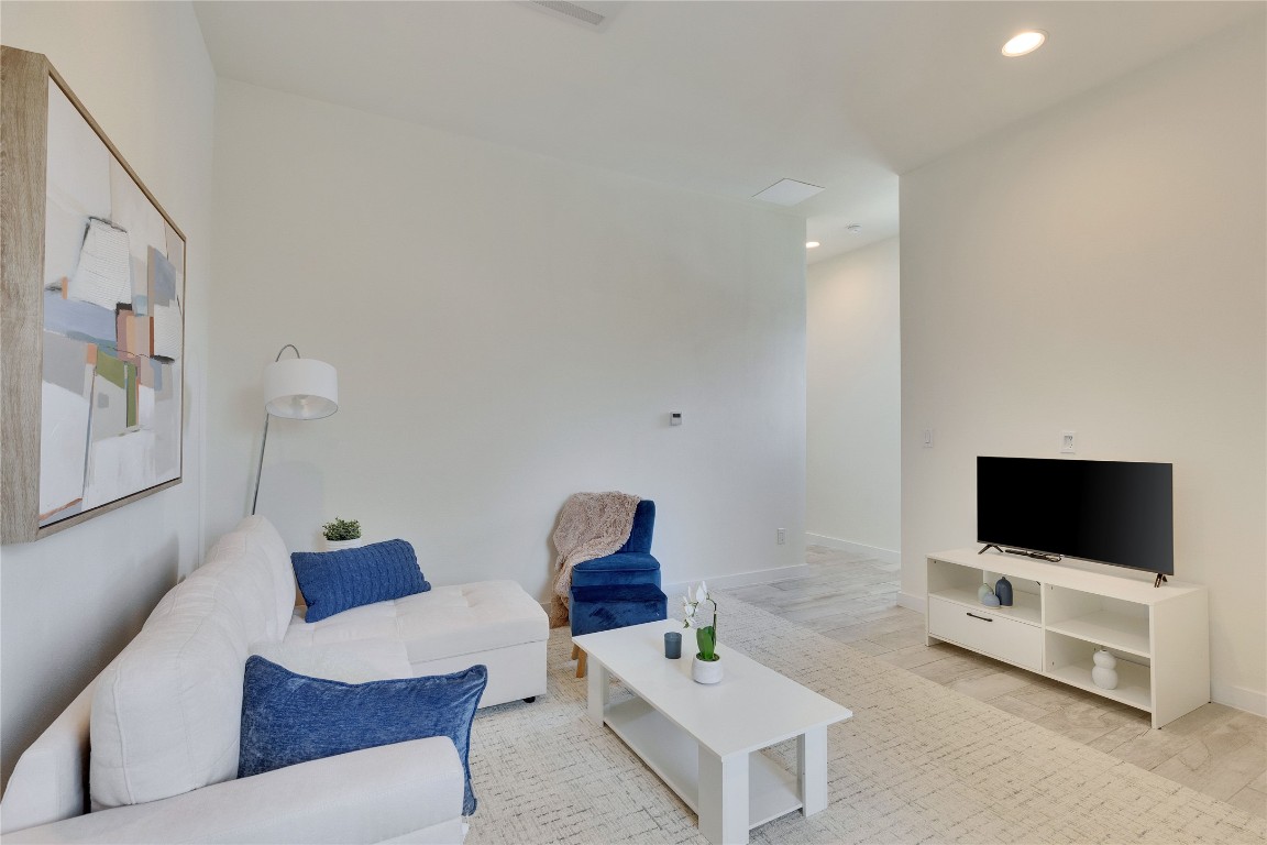 808 Lydia Street Austin, TX 78702 - Photo 40 of 40 a living room with furniture and a flat screen tv