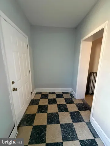 a black and white checkered floor with a black white checkered floor