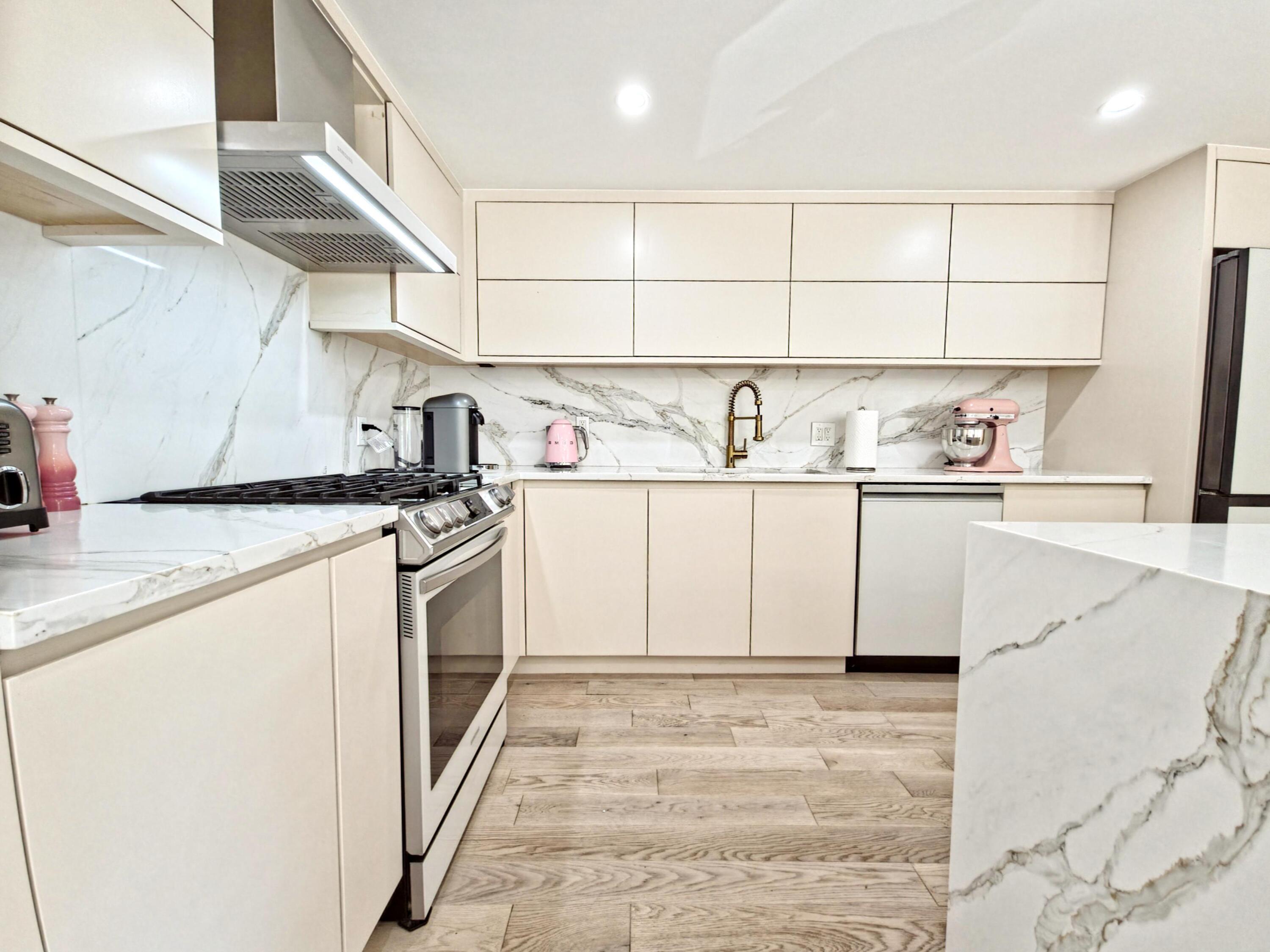 22 Keel Way Hyannis, MA 02601 - Photo 22 of 42 a kitchen with stainless steel appliances granite countertop a sink and cabinets