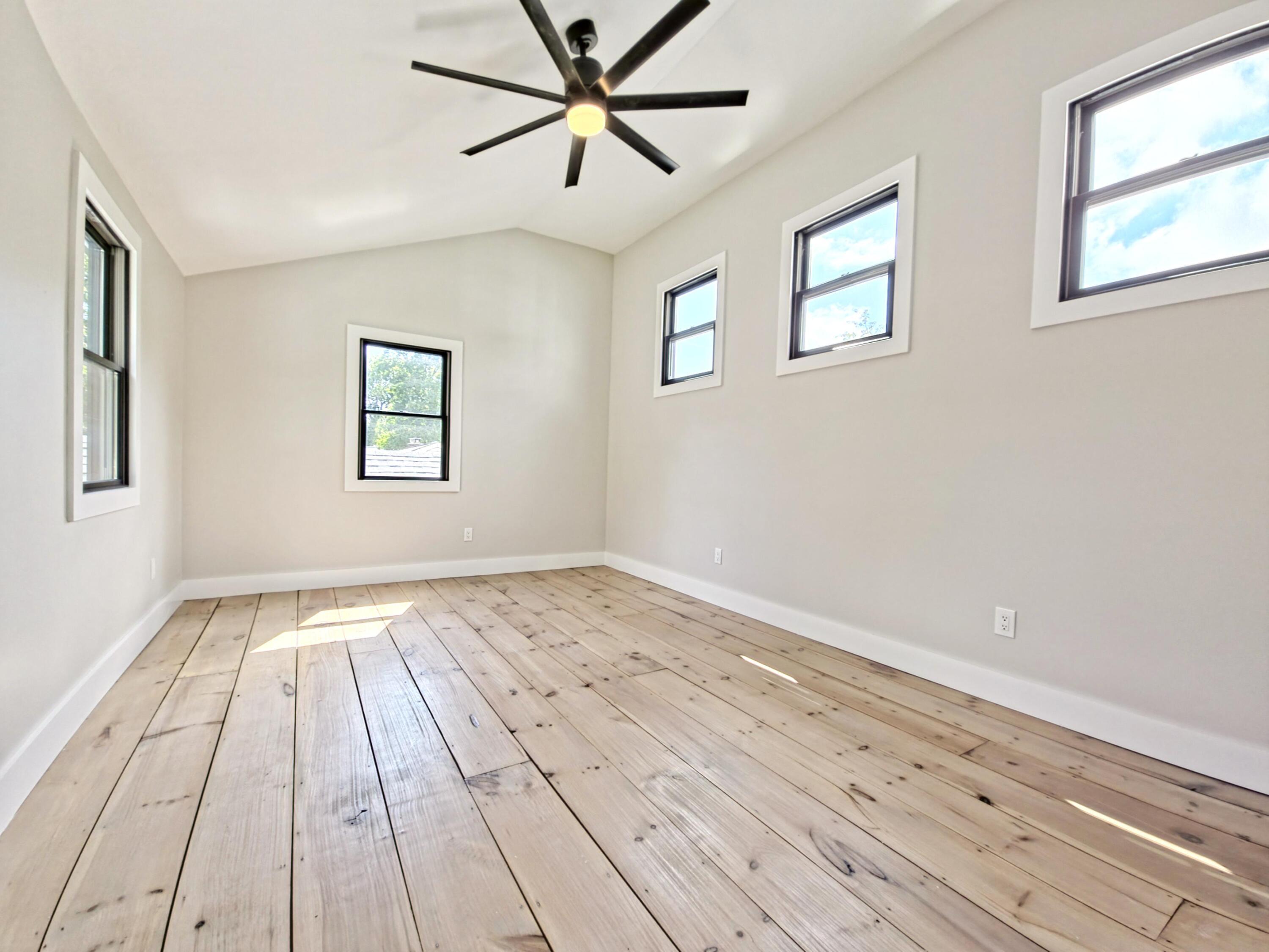 22 Keel Way Hyannis, MA 02601 - Photo 26 of 42 a view of empty room with wooden floor and fan