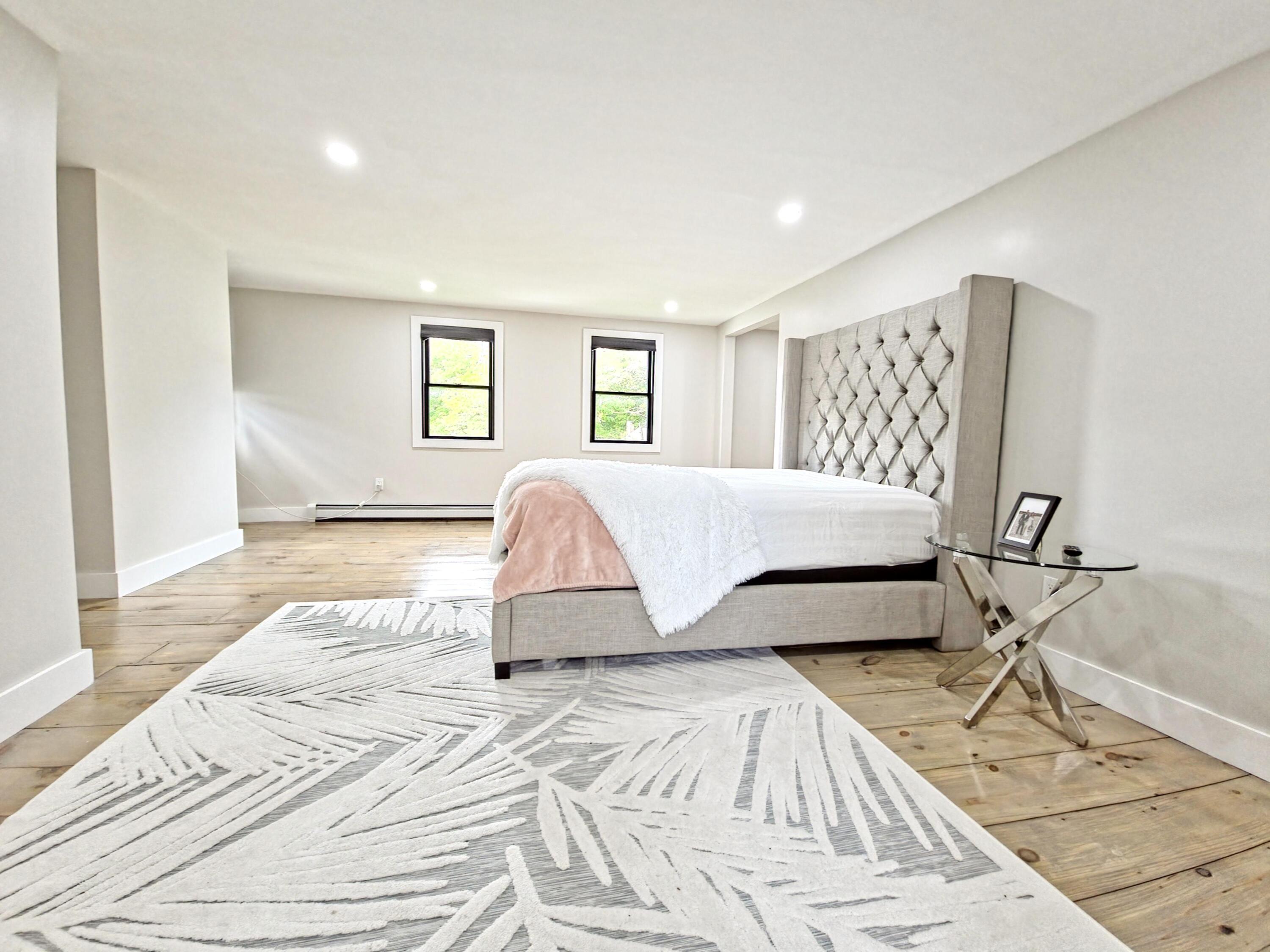 22 Keel Way Hyannis, MA 02601 - Photo 29 of 42 a bedroom with a bed and a walk in closet