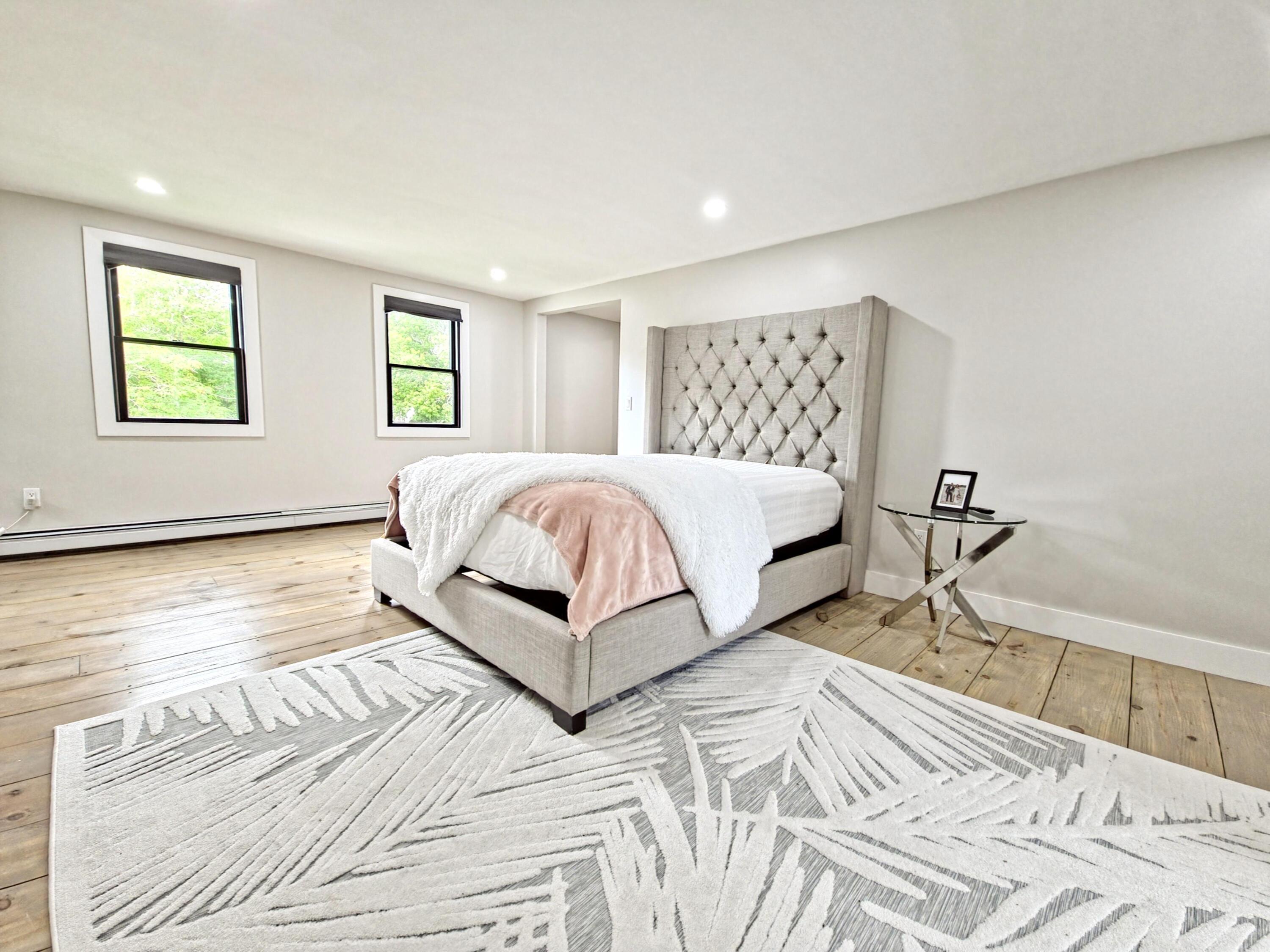 22 Keel Way Hyannis, MA 02601 - Photo 30 of 42 a bedroom with a large bed and a window