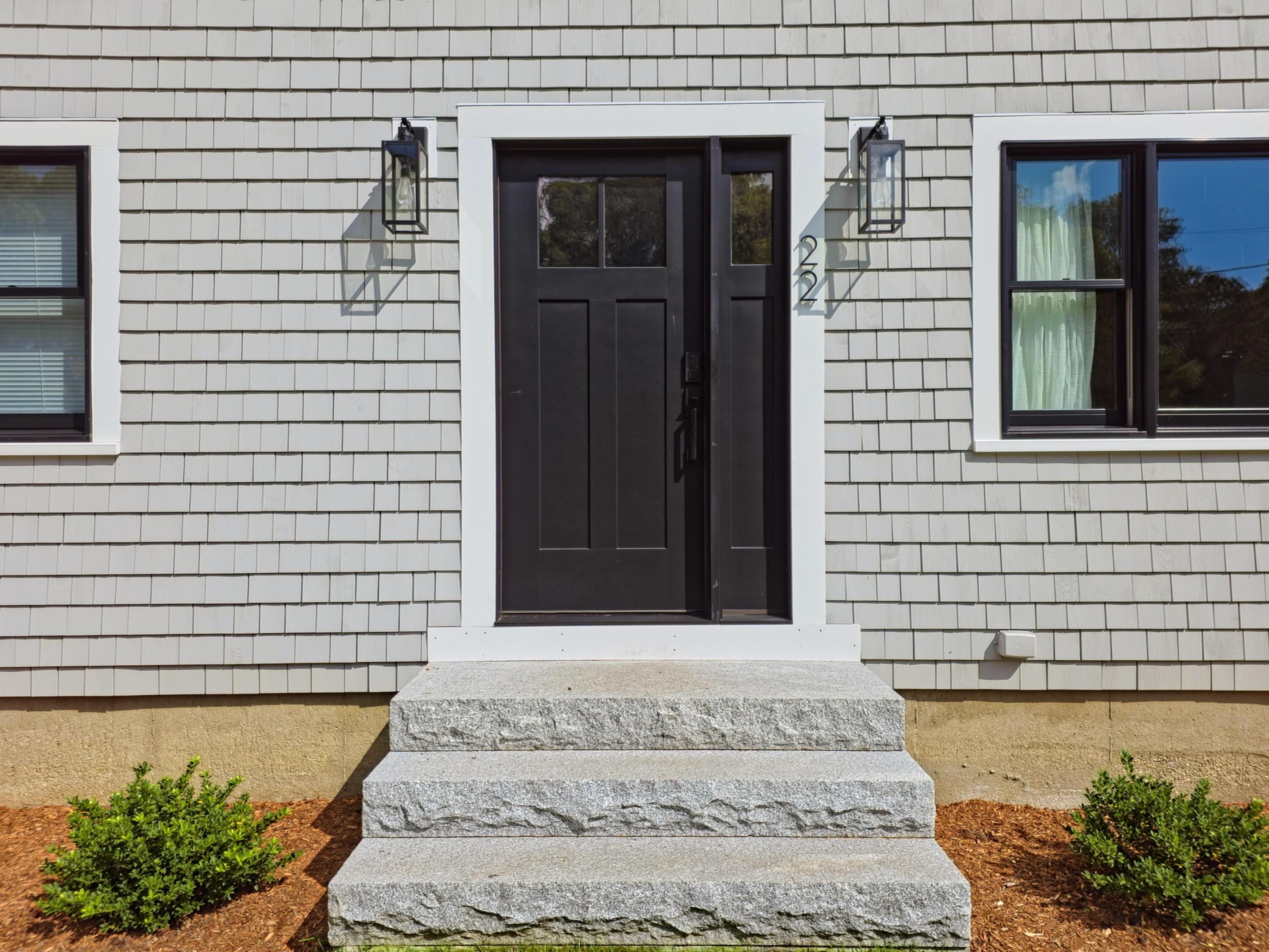 22 Keel Way Hyannis, MA 02601 - Photo 3 of 42 a front view of a house with a garden