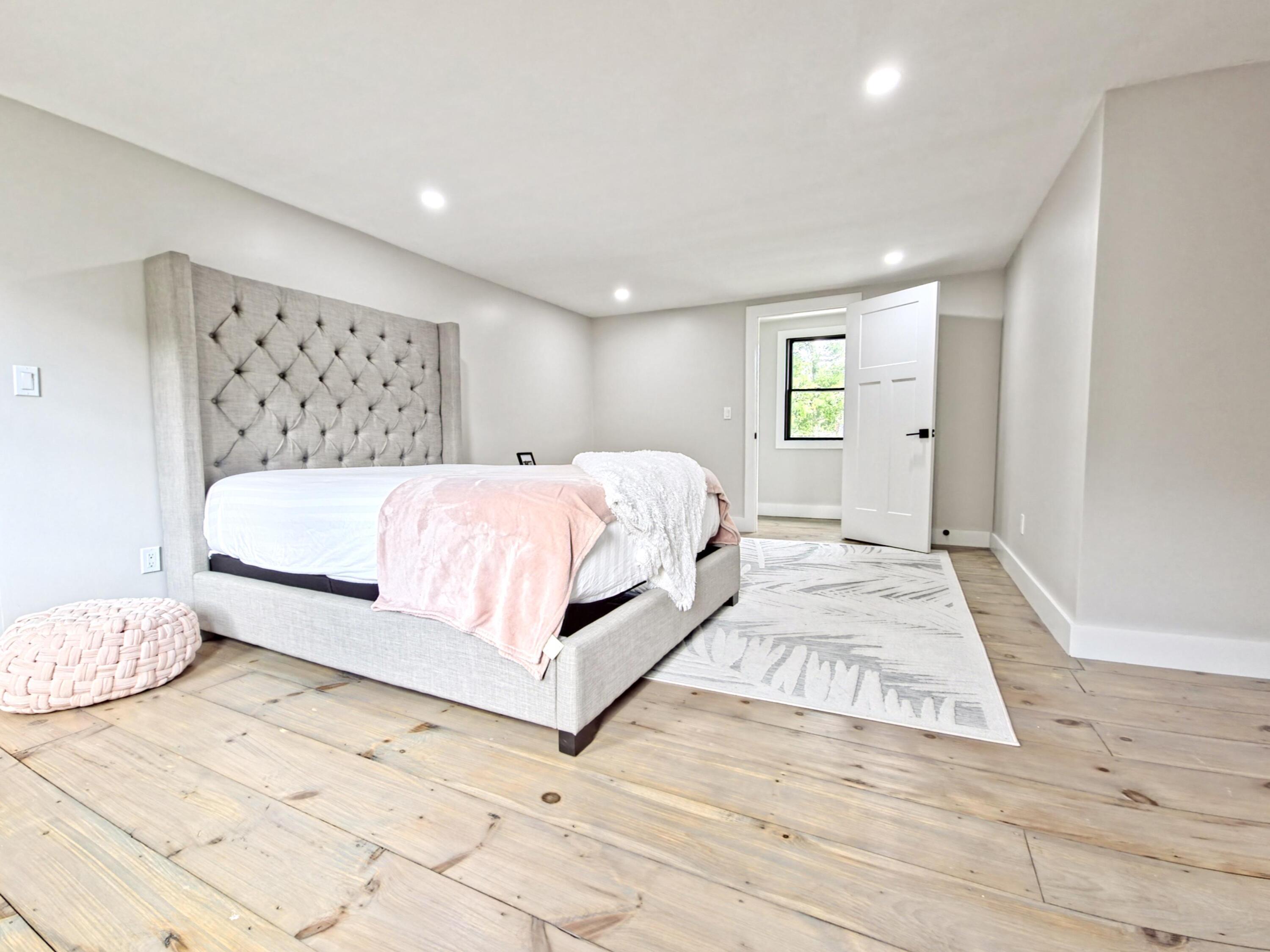 22 Keel Way Hyannis, MA 02601 - Photo 31 of 42 a bedroom with a large bed and a walk in closet