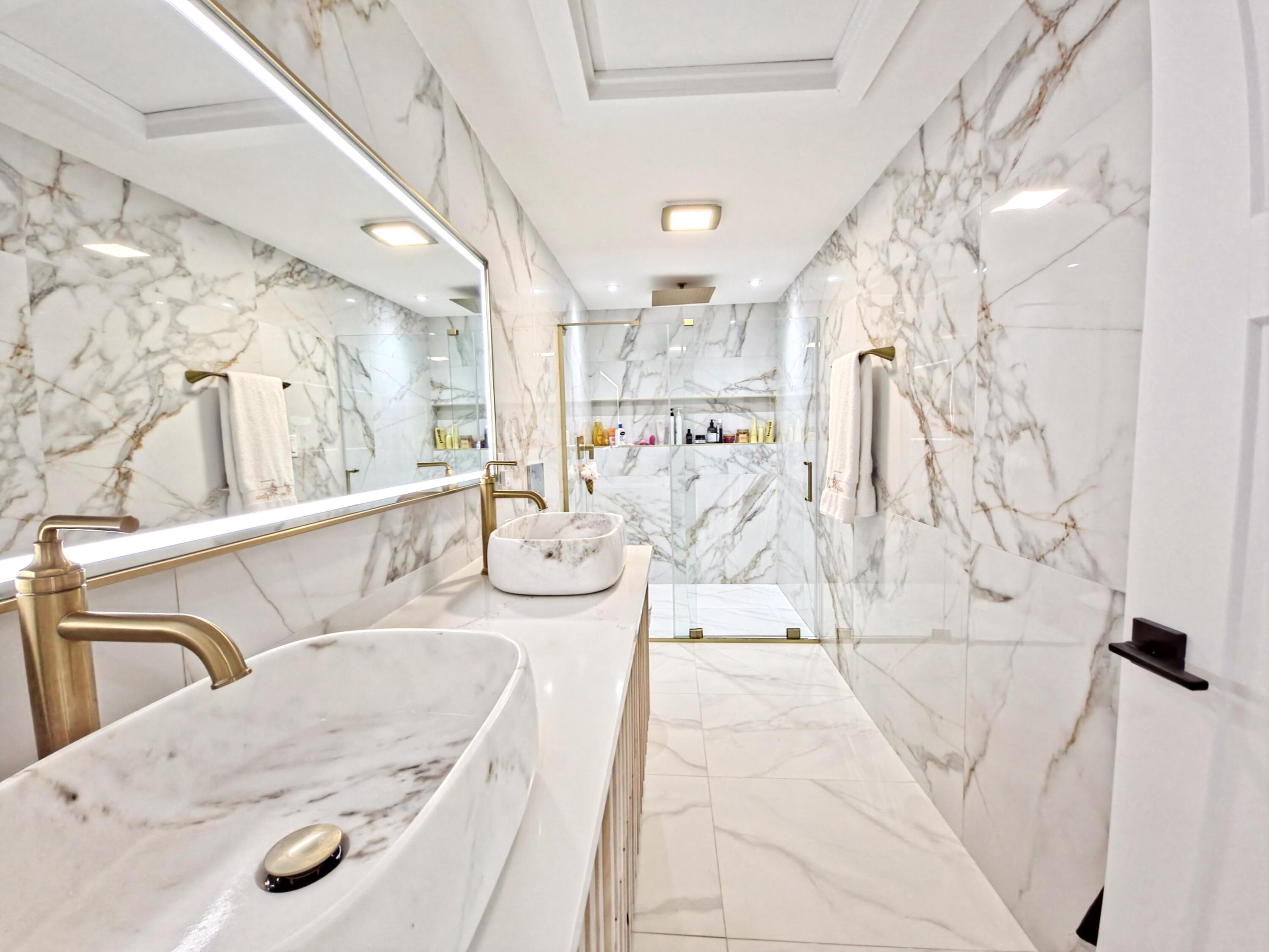 22 Keel Way Hyannis, MA 02601 - Photo 33 of 42 a bathroom with a tub sink and mirror