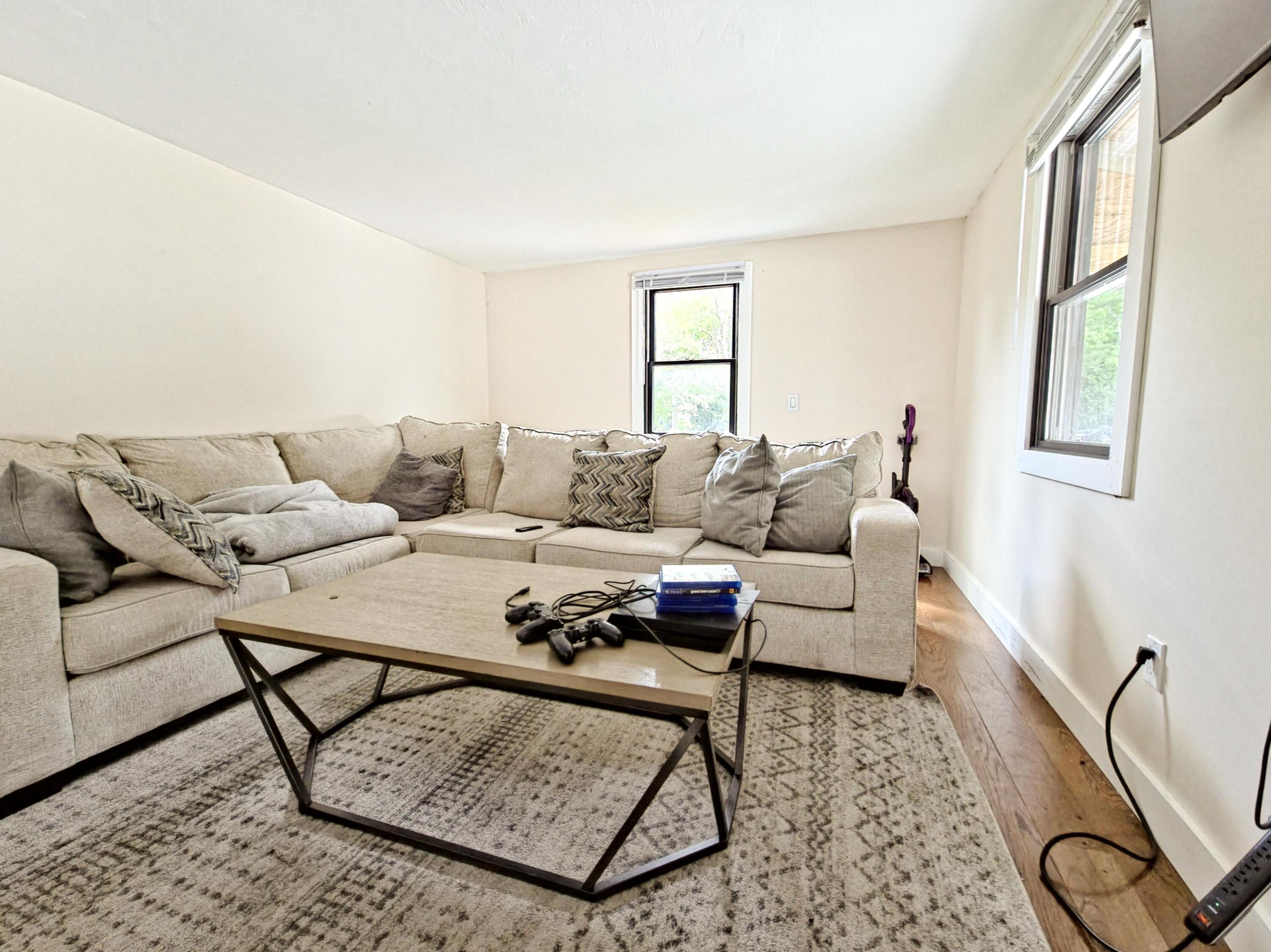 22 Keel Way Hyannis, MA 02601 - Photo 37 of 42 a living room with furniture and a window