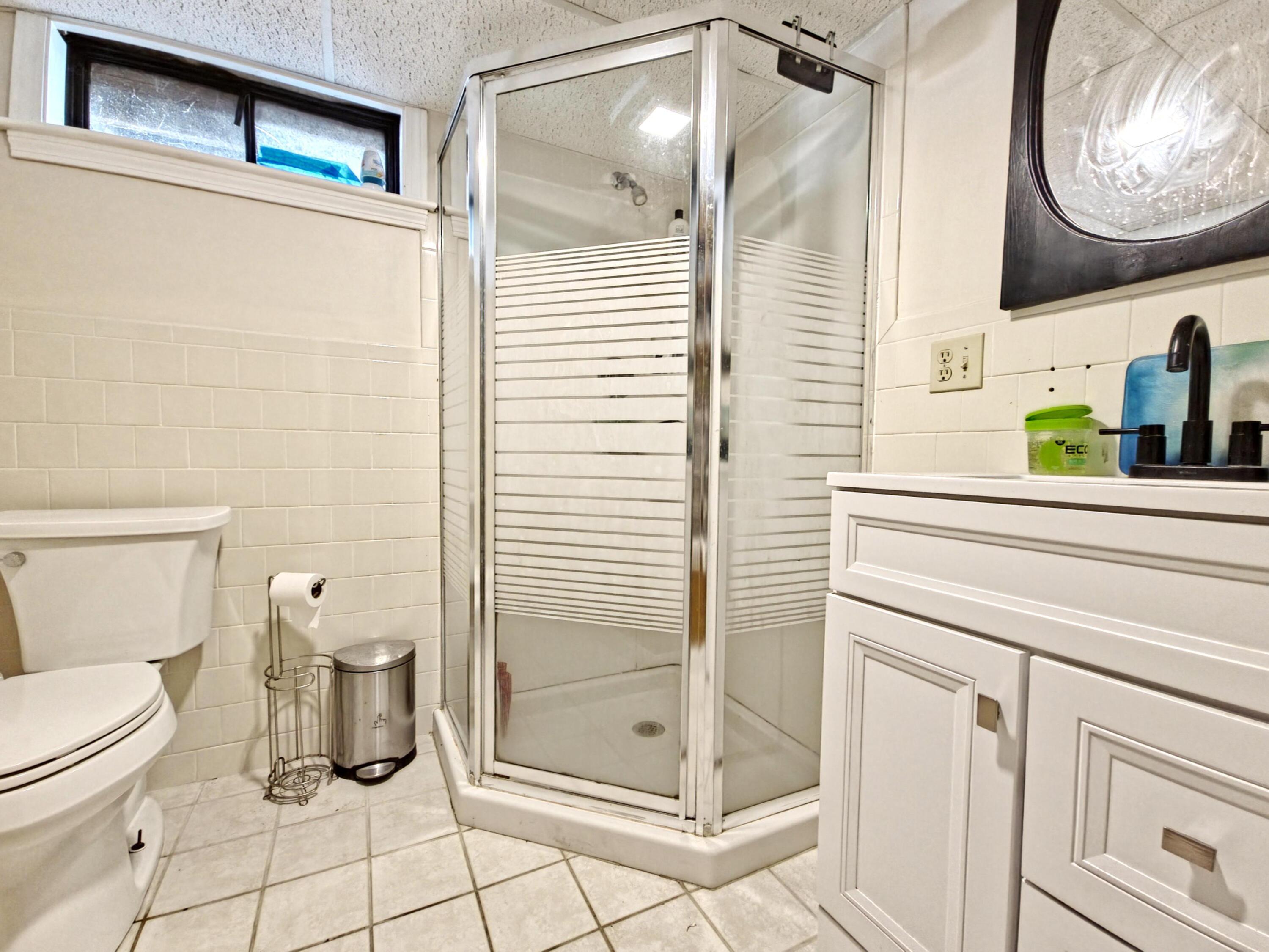 22 Keel Way Hyannis, MA 02601 - Photo 39 of 42 a bathroom with a toilet a sink and shower