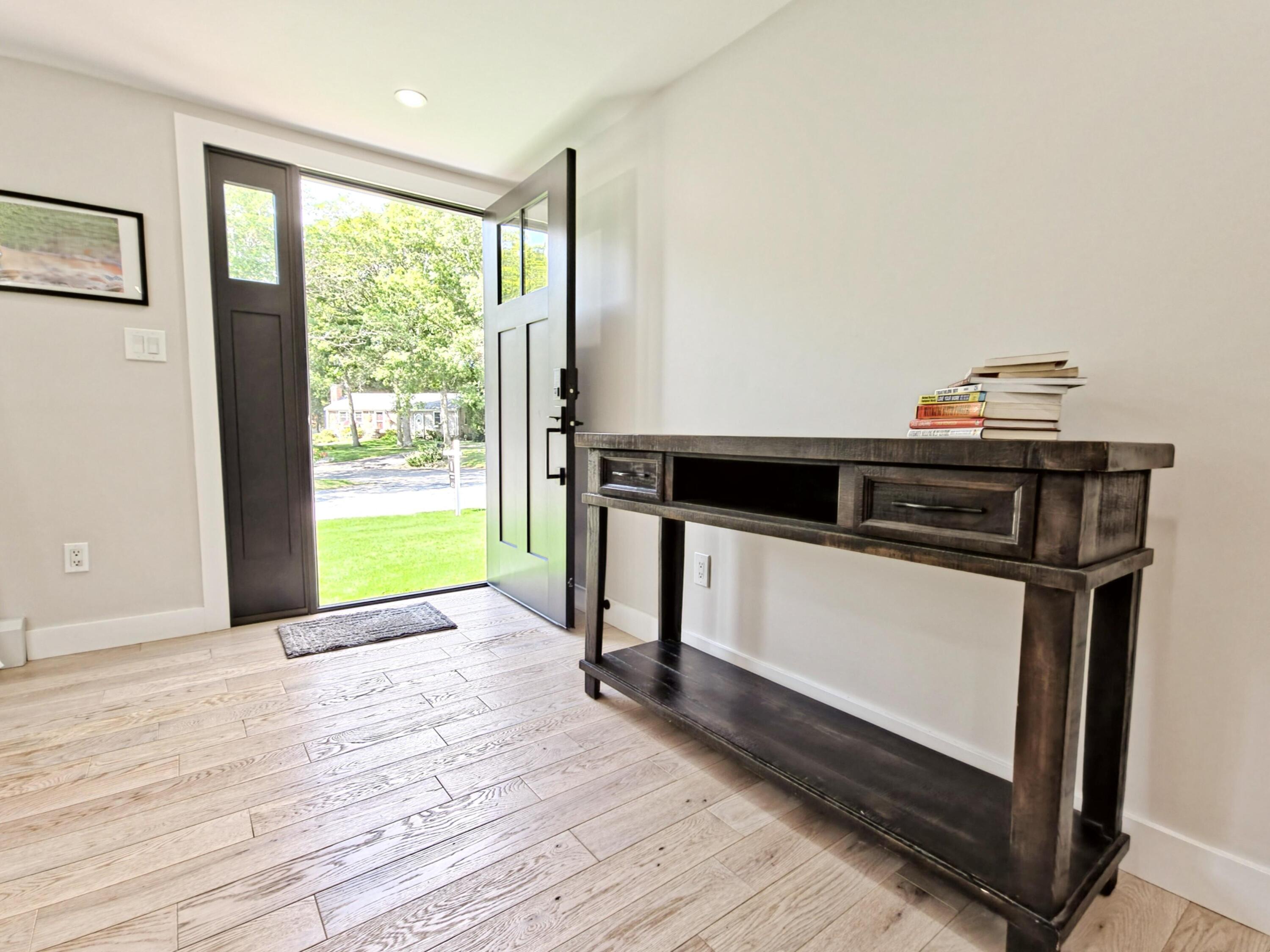22 Keel Way Hyannis, MA 02601 - Photo 4 of 42 a view of a bedroom with wooden floor and a window