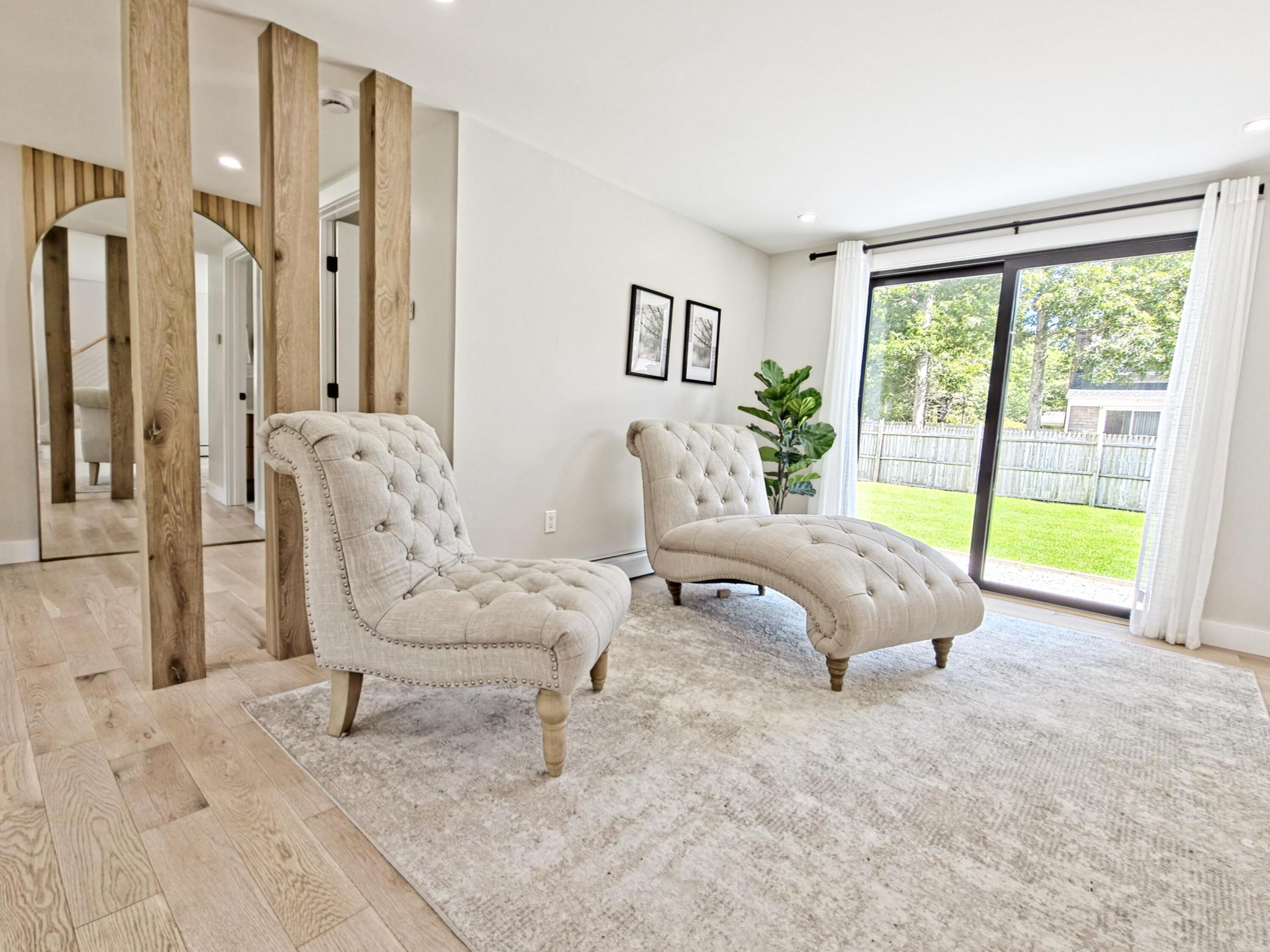 22 Keel Way Hyannis, MA 02601 - Photo 7 of 42 a living room with furniture and a large window