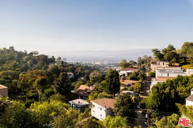 an aerial view of a city with lots of residential buildings