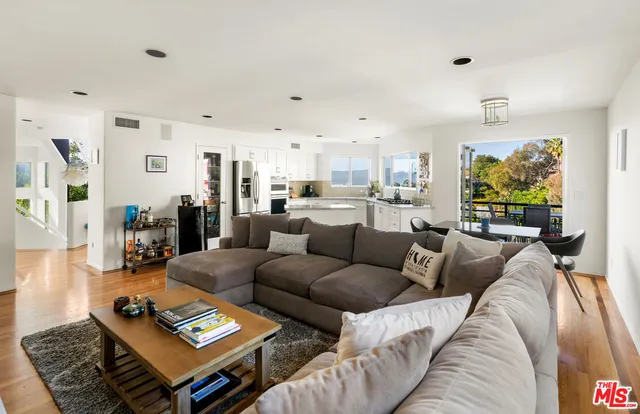 a living room with furniture and a couch