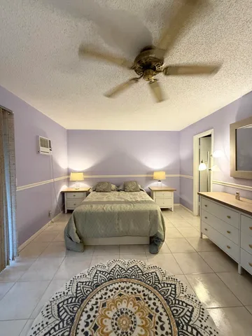 a bathroom with a shower and a toilet