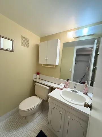 a view of a big yard with a trees