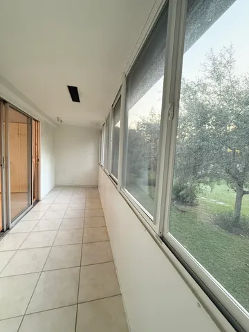 an aerial view of residential house with outdoor space