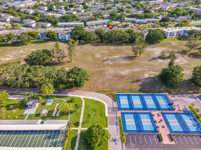 a outdoor space with a table and plants