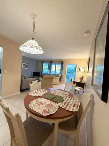 a stove top oven sitting inside of a kitchen