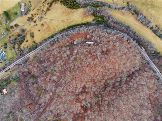 1154 Lusters Gate Road Christiansburg, VA 24073 - Photo 16 of 25 a view of a yard with a wooden fence