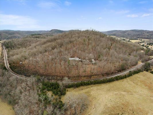 1154 Lusters Gate Road Christiansburg, VA 24073 - Photo 3 of 25 a view of a lake in middle of the forest