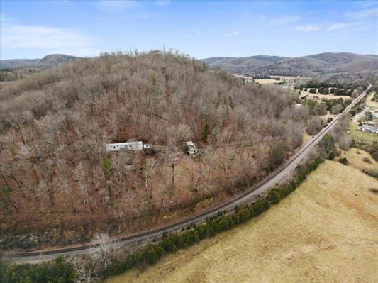 1154 Lusters Gate Road Christiansburg, VA 24073 - Photo 5 of 25 a view of a forest with a mountain