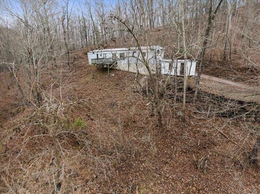 1154 Lusters Gate Road Christiansburg, VA 24073 - Photo 7 of 25 a backyard of a house with table and chairs