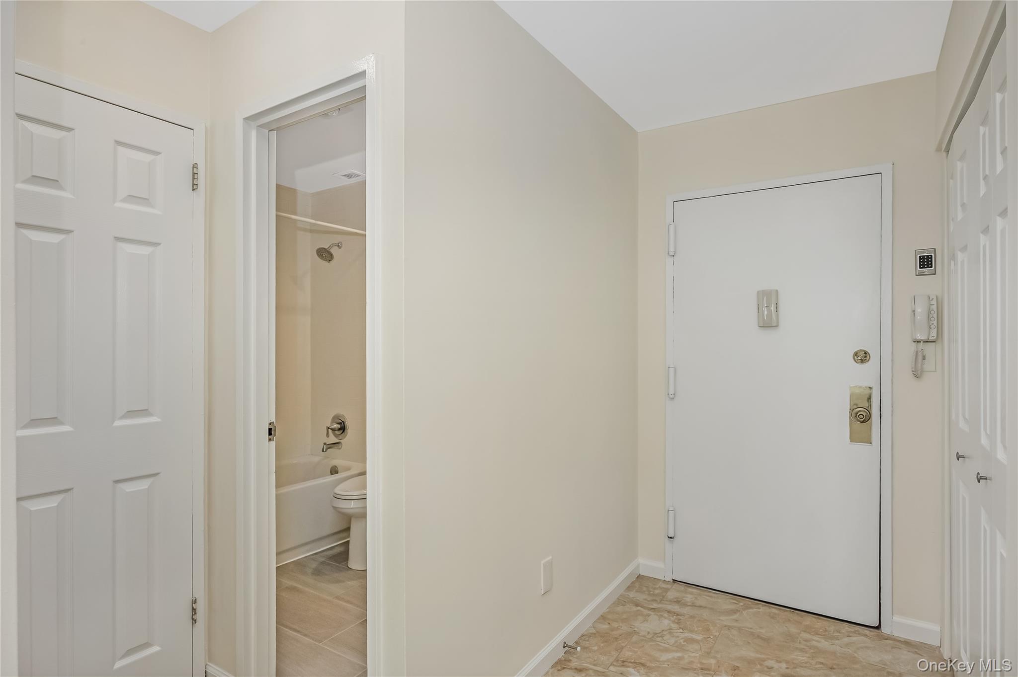 2 Richmond Road, Unit 6M Lido Beach, NY 11561 - Photo 17 of 21 a view of a bathroom with a shower