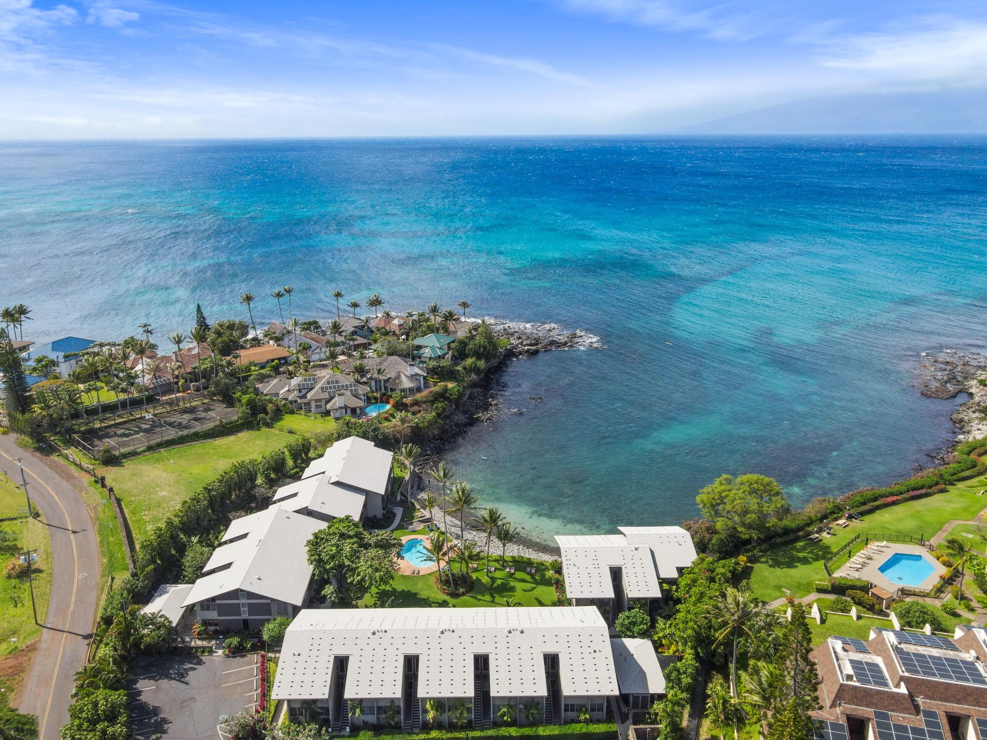 5255 Lower Honoapiilani Road, Unit 207 Lahaina, HI 96761 - Photo 43 of 49 an aerial view of multiple house