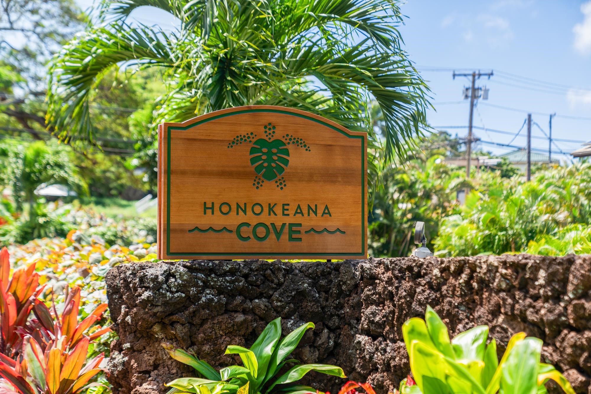 5255 Lower Honoapiilani Road, Unit 207 Lahaina, HI 96761 - Photo 49 of 49 a sign that is on a brick wall