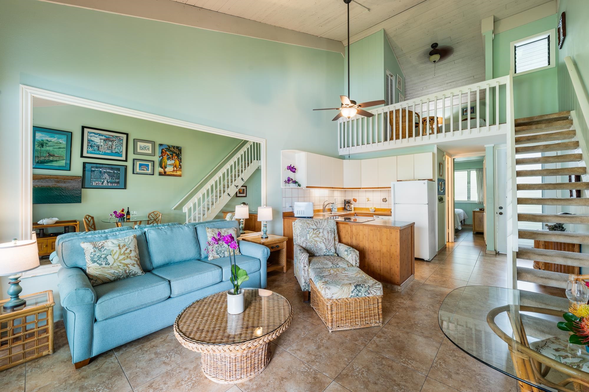 5255 Lower Honoapiilani Road, Unit 207 Lahaina, HI 96761 - Photo 6 of 49 a living room with furniture and a potted plant