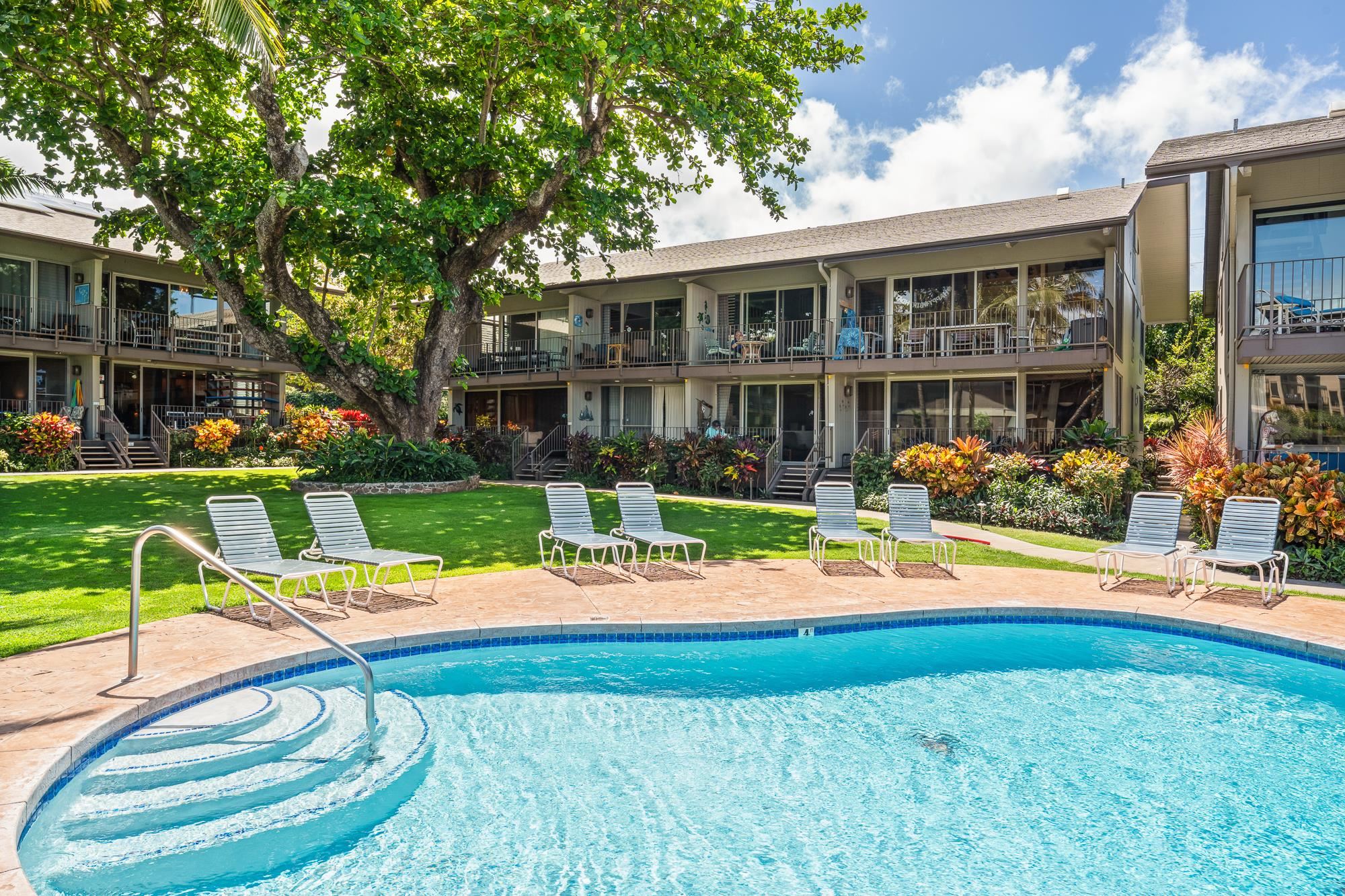 5255 Lower Honoapiilani Road, Unit 207 Lahaina, HI 96761 - Photo 8 of 49 a view of a house with a yard patio and swimming pool