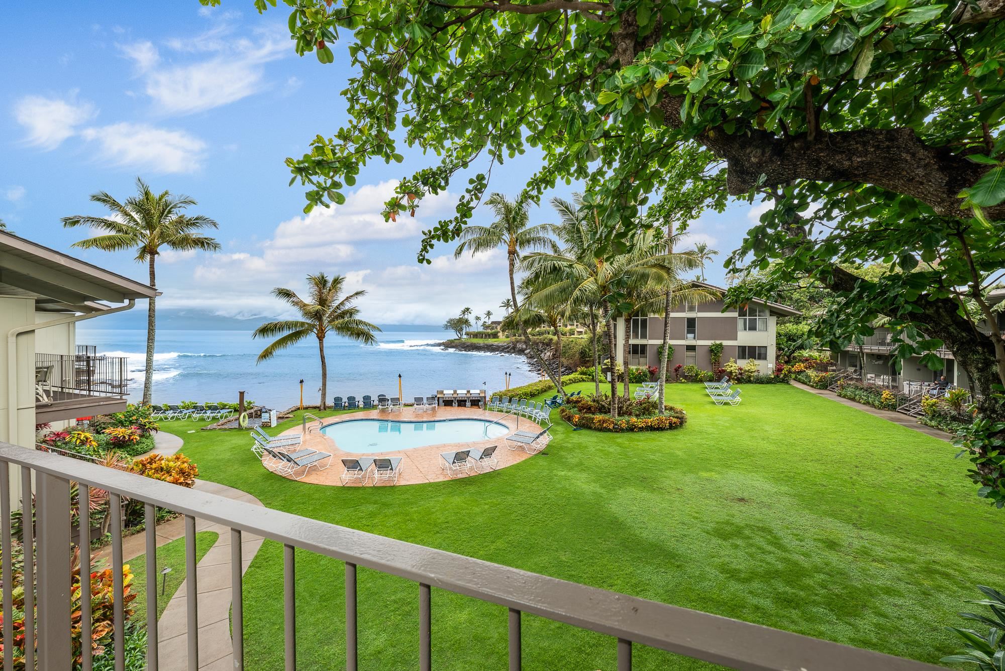 5255 Lower Honoapiilani Road, Unit 207 Lahaina, HI 96761 - Photo 9 of 49 a view of an house with backyard space and garden