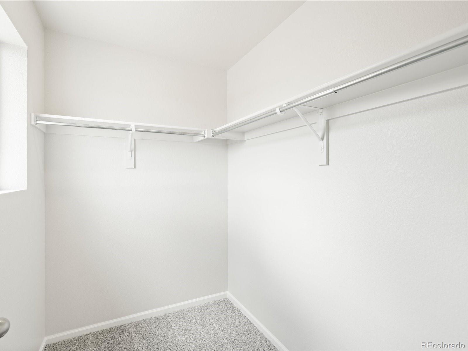 14472 Pansy Loop Morrison, CO 80465 - Photo 28 of 37 a view of an empty walk in closet