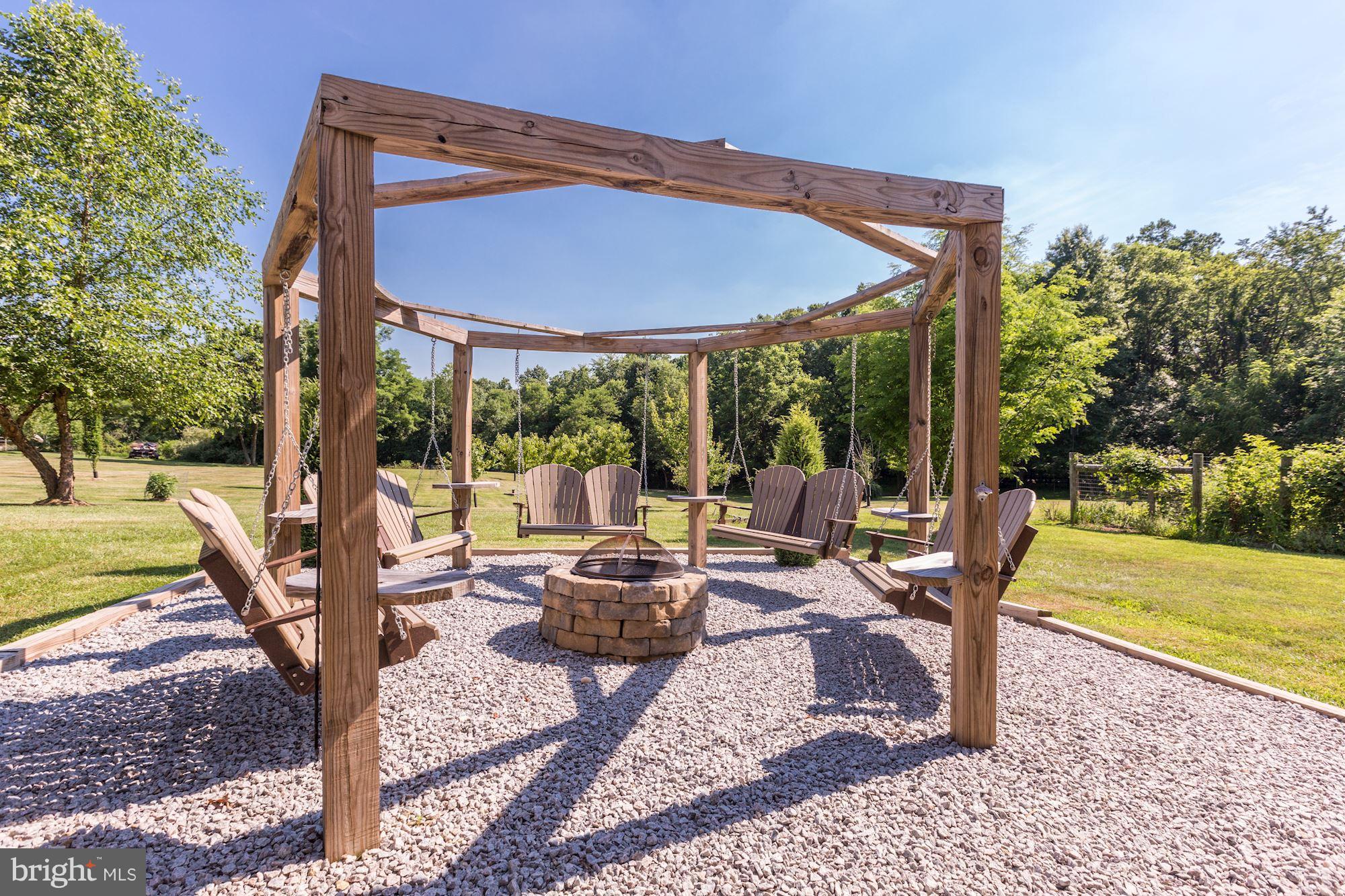 19995 Colchester Road Purcellville, VA 20132 - Photo 29 of 30 Custom swings surrounded by fire pit