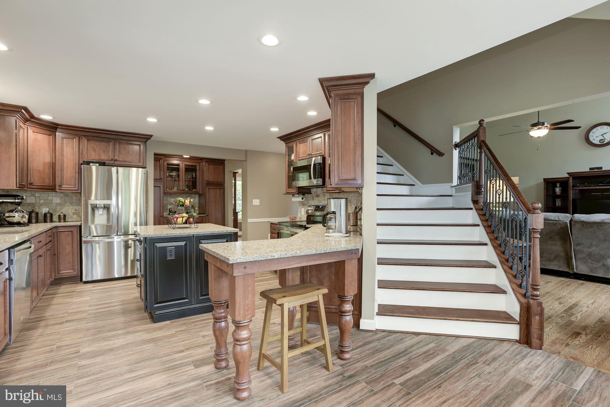 19995 Colchester Road Purcellville, VA 20132 - Photo 9 of 30 Beautiful wooden staircase w/ metal balusters