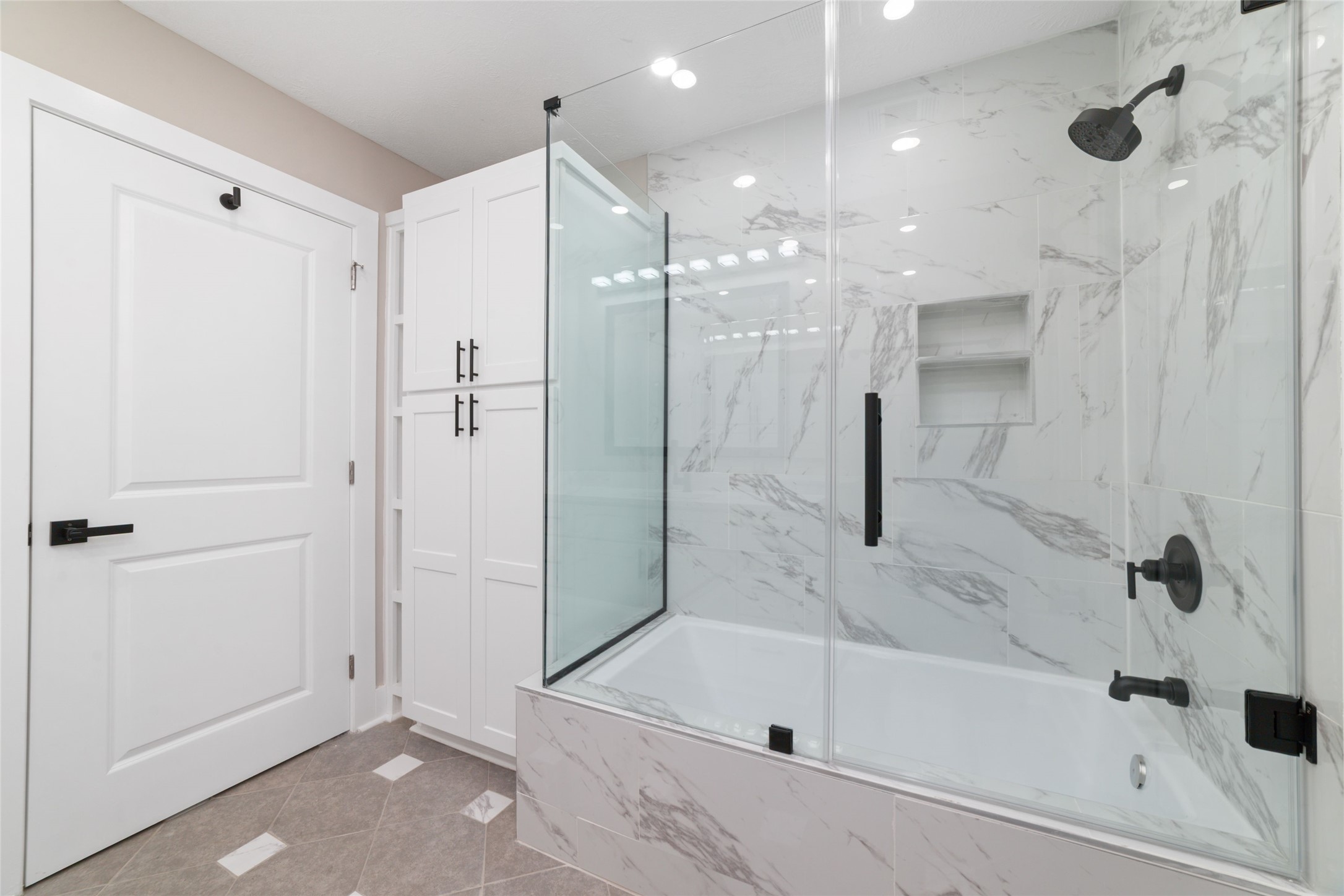 13431 Vrlla Road Guy, TX 77444 - Photo 19 of 32 a bathroom with a bathtub and a shower