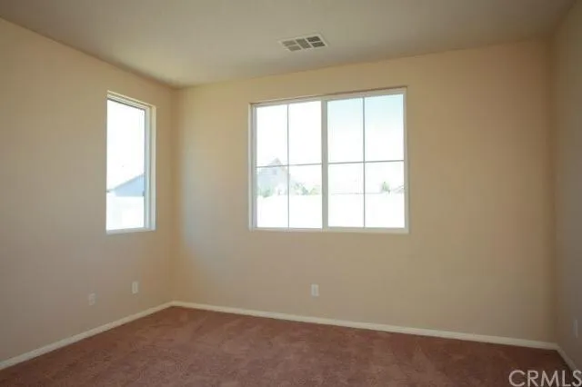 a bathroom with a shower and a toilet