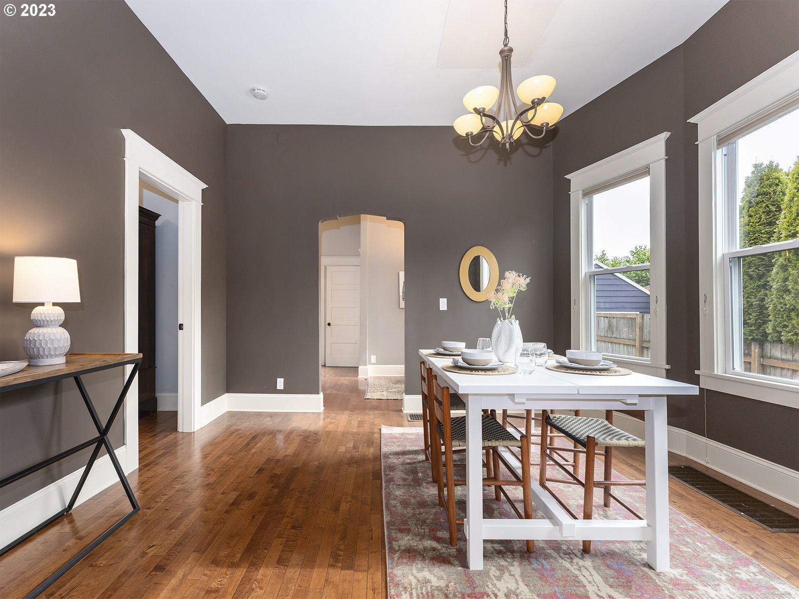 314 Northeast 69th Avenue Portland, OR 97213 - Photo 9 of 37 a view of a dining room with furniture window and wooden floor
