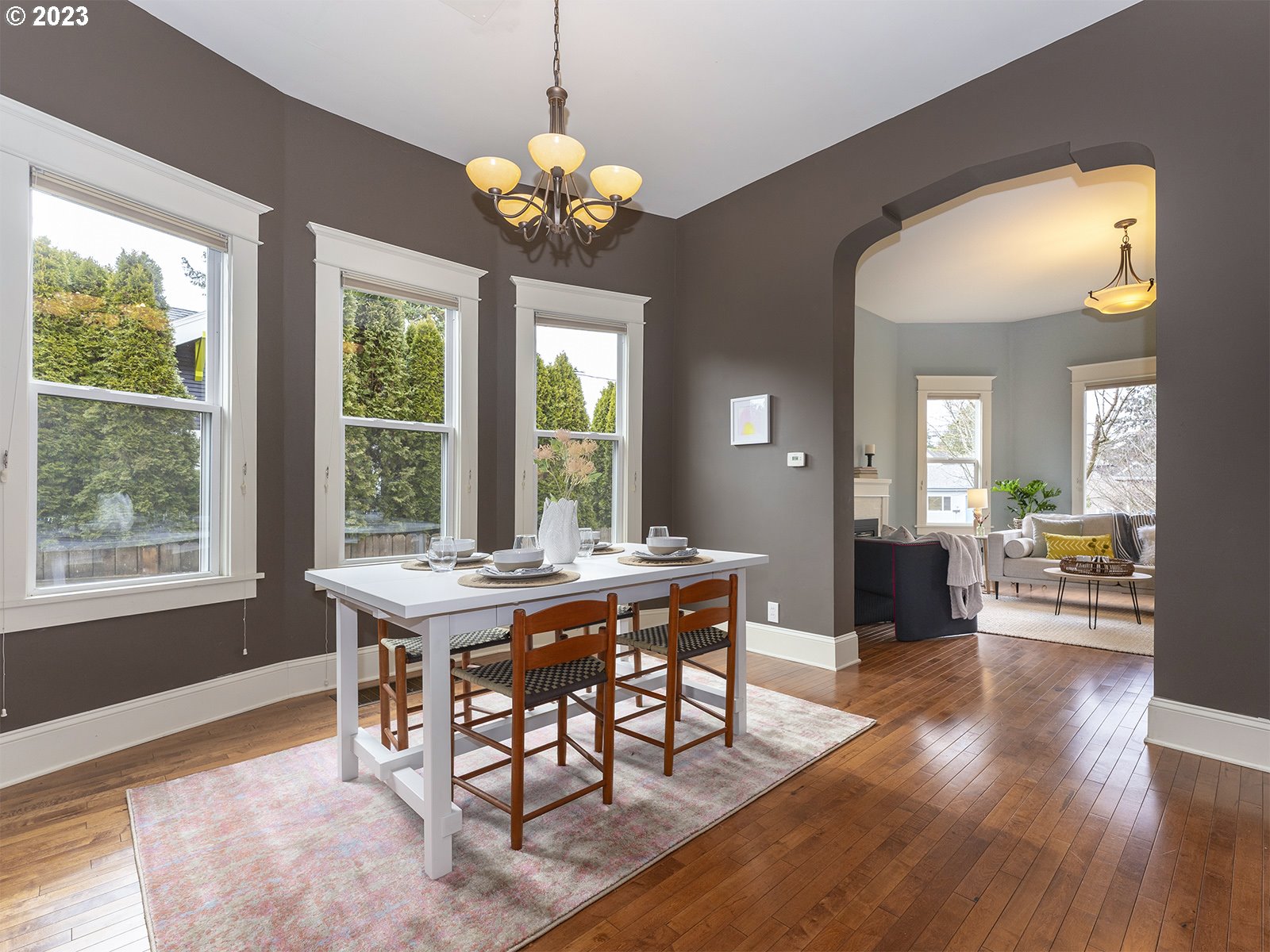 314 Northeast 69th Avenue Portland, OR 97213 - Photo 10 of 37 a view of a dining room with furniture window and wooden floor