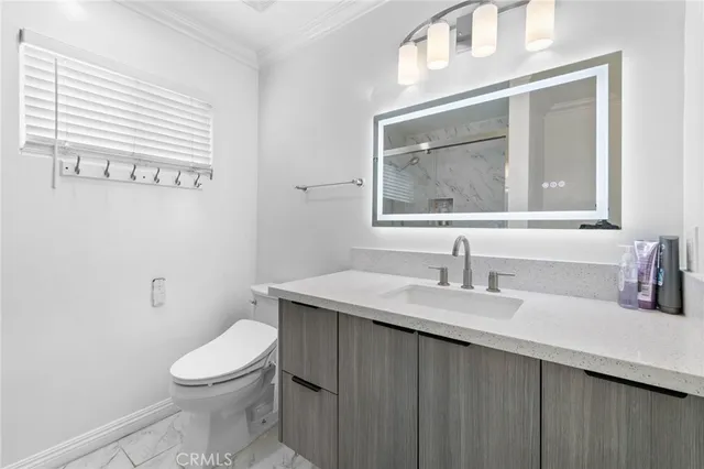 a bathroom with a shower and toilet