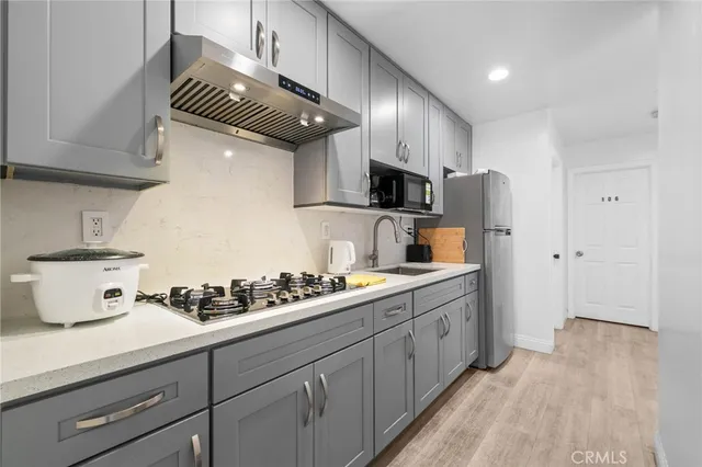 a view of hallway with washer and dryer