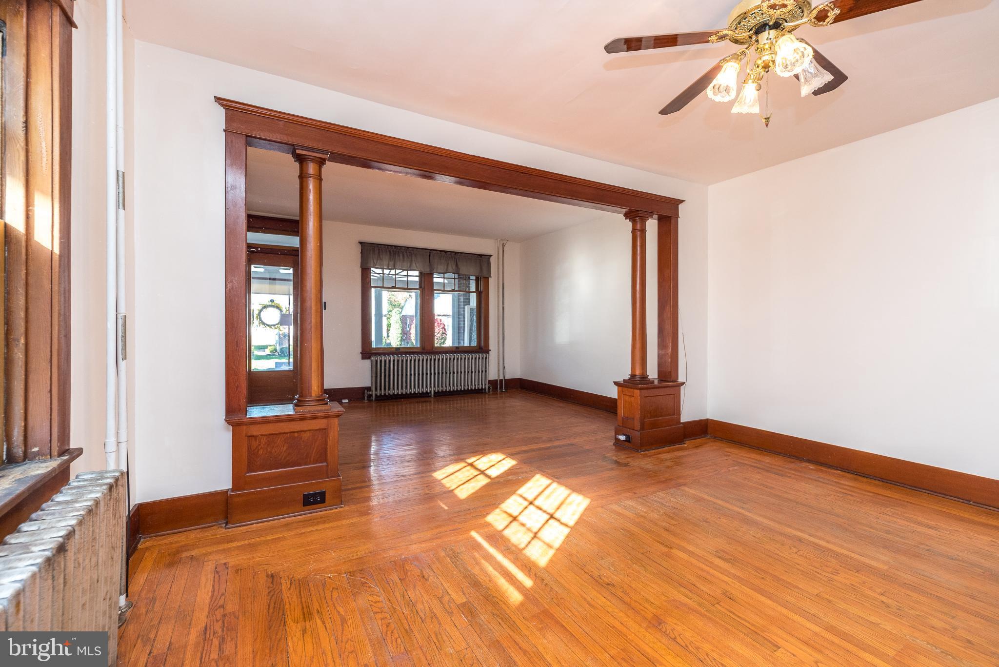 27 South 7th Street Quakertown, PA 18951 - Photo 7 of 33 a view of a livingroom with wooden floor and furniture