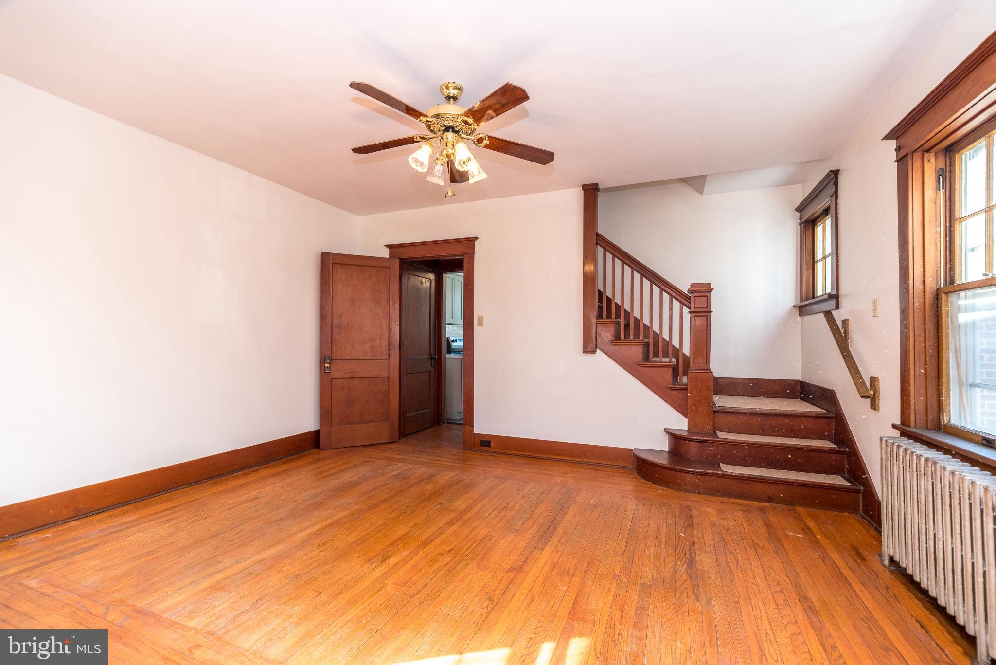 27 South 7th Street Quakertown, PA 18951 - Photo 9 of 33 a view of an empty room with wooden floor and a window