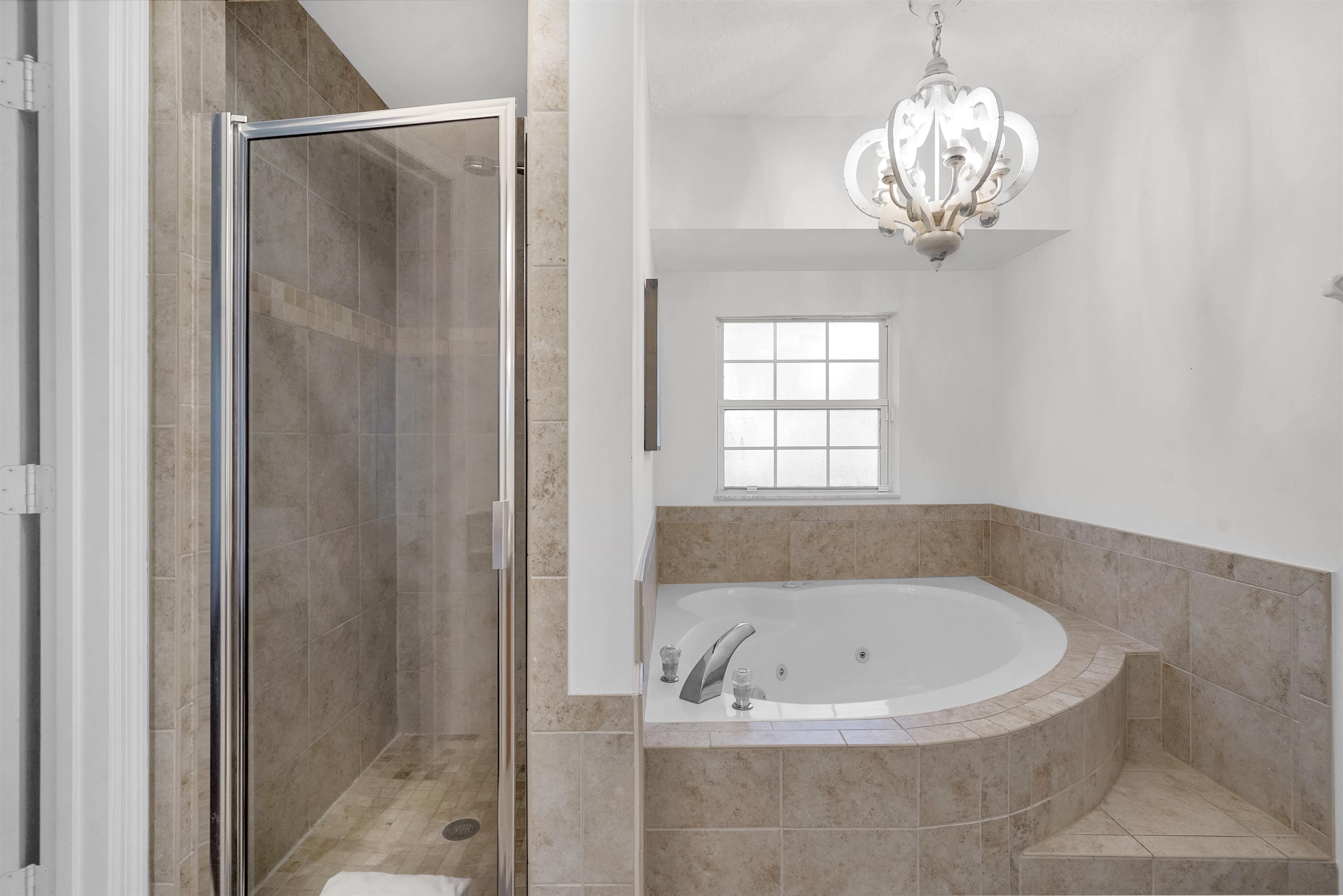 404 Fourteenth Street St. Augustine, FL 32084 - Photo 19 of 35 a white bath tub sitting next to a window