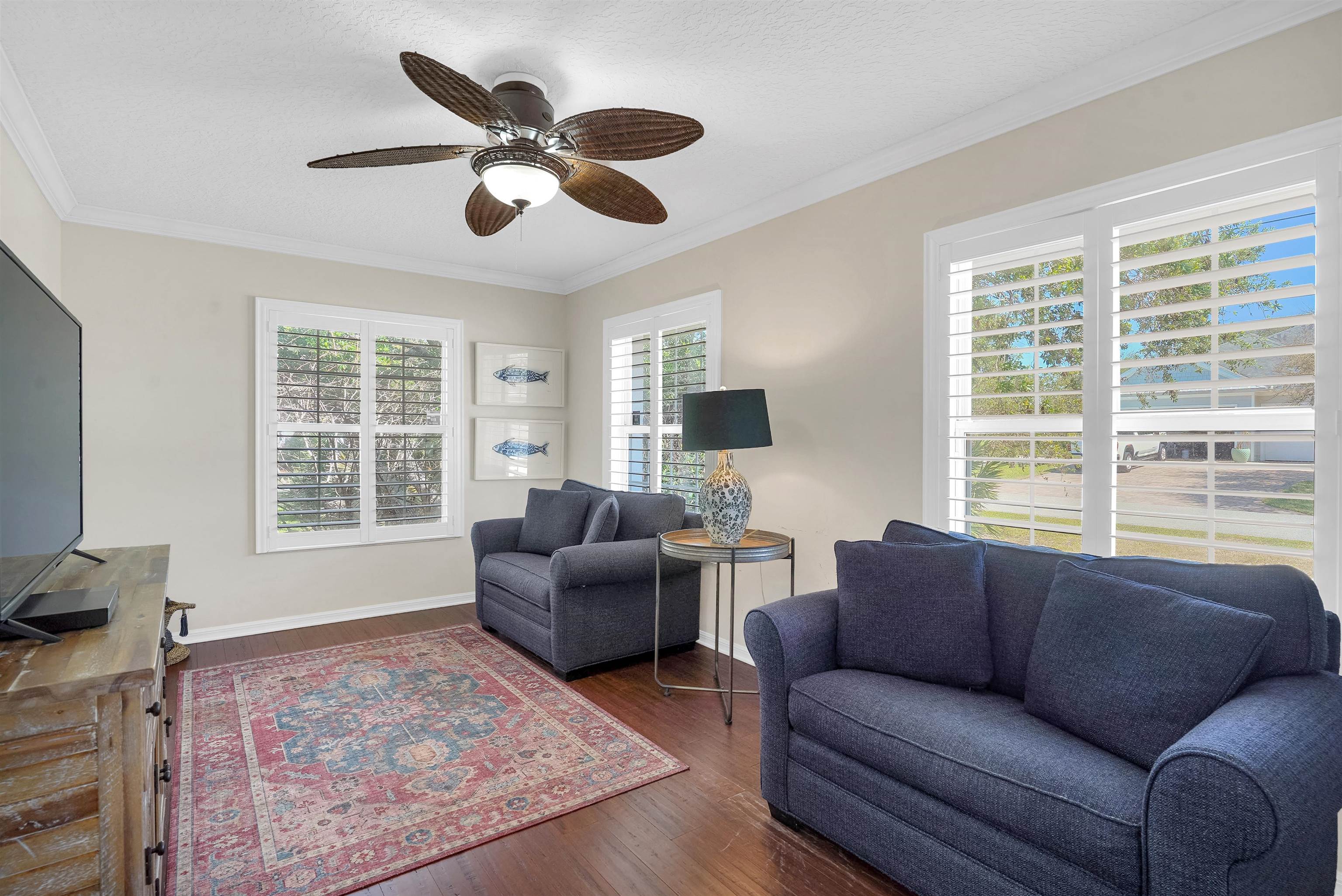 404 Fourteenth Street St. Augustine, FL 32084 - Photo 20 of 35 a living room with furniture and a large window