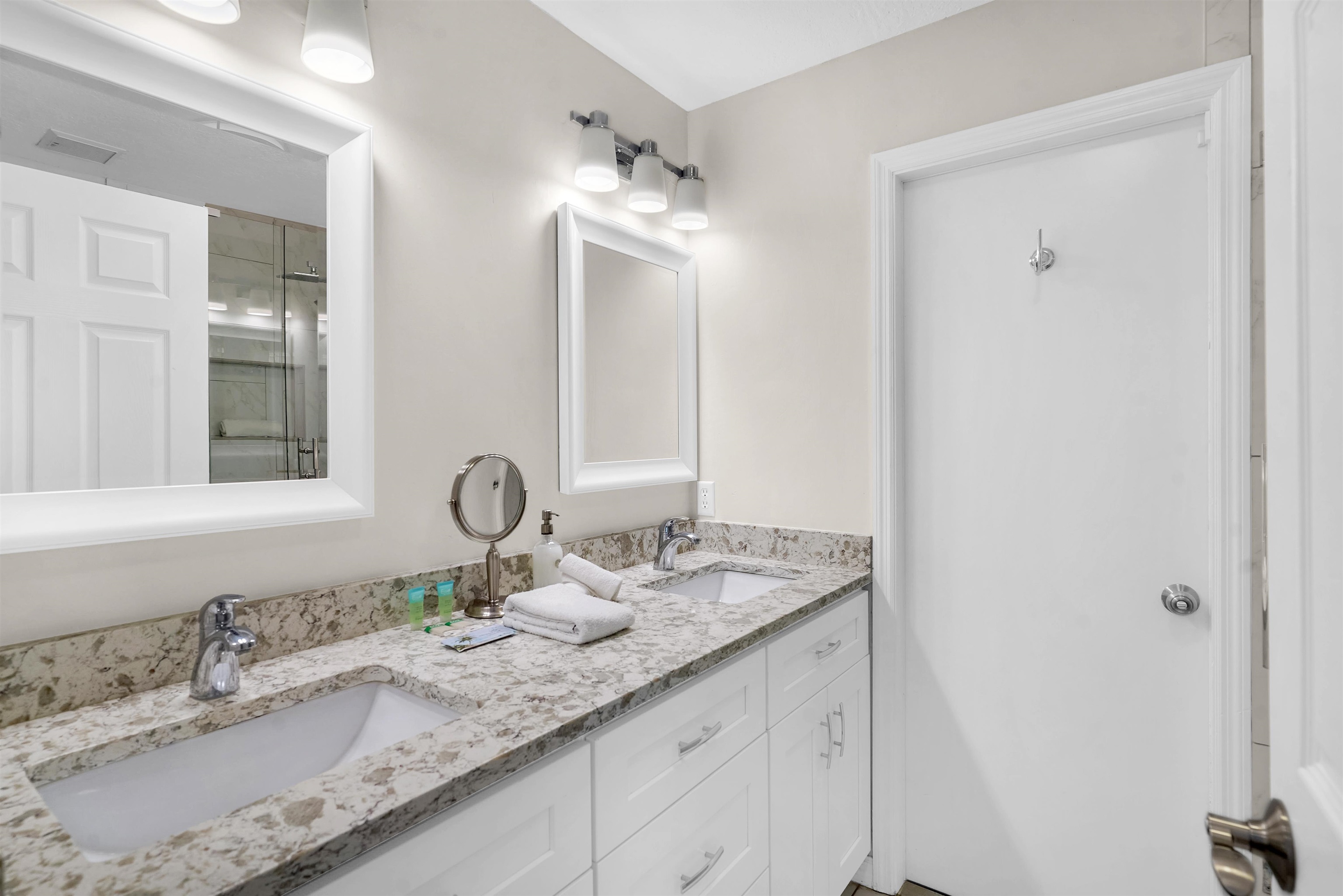 404 Fourteenth Street St. Augustine, FL 32084 - Photo 22 of 35 a bathroom with a granite countertop sink double and mirror