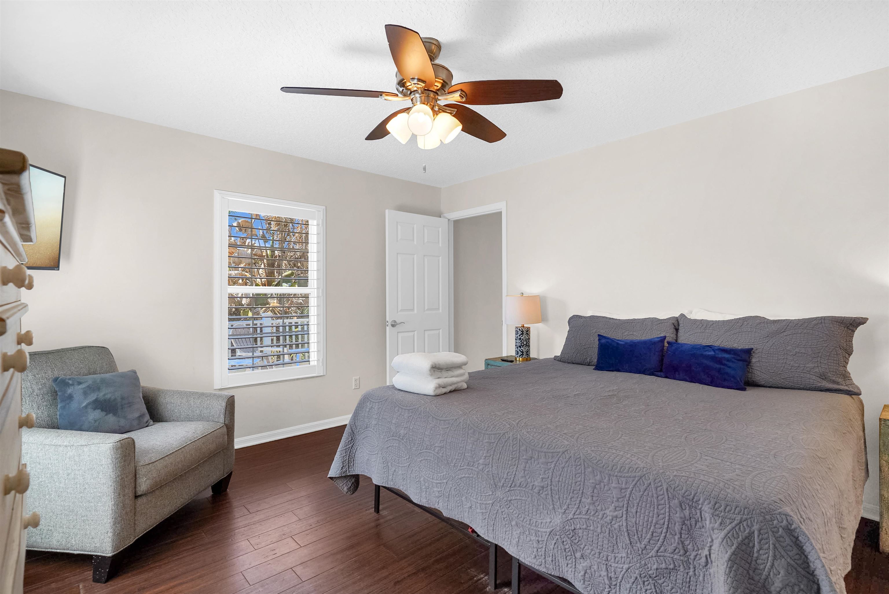 404 Fourteenth Street St. Augustine, FL 32084 - Photo 27 of 35 a bedroom with a large bed couch and a window